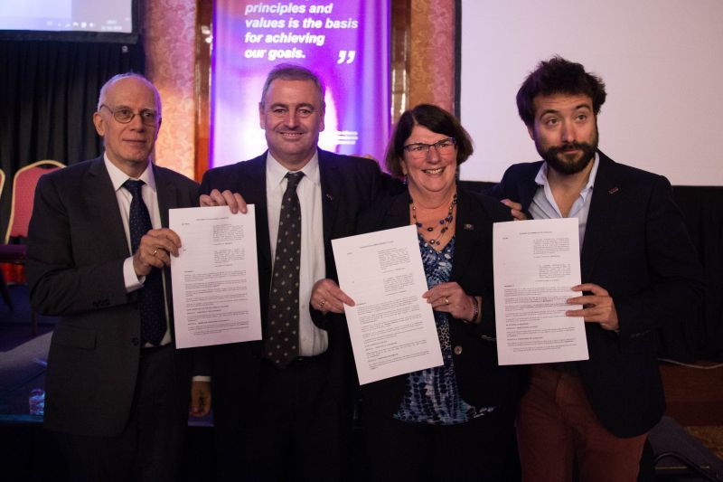 Signature by the Chair of the ICA Youth Network, Sebastien Chaillou, the Executive Director of Cooperative and Mutuals Canada, Denyse Guy and the Director General of the ICA, Bruno Roelants.